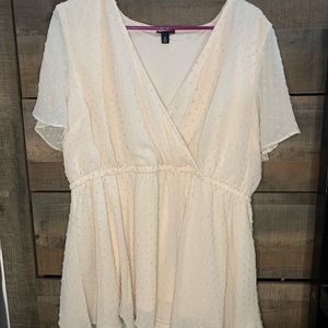 Cream colored blouse with colored dots